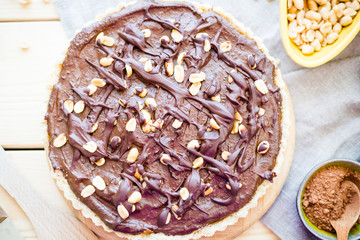 Top View of Paleo Avocado Banana Chocolate Cake on White Wooden Background, Horizontal Top View, Wallpaper