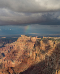 Awesome rainbow above South Rim of Grand Canyon, Arizona, US