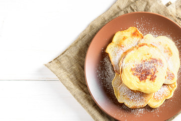 Top view: small pancakes withsugar powder