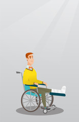 Fototapeta premium Man with broken leg sitting in a wheelchair.
