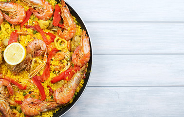 Pot with paella dish. Copy space.