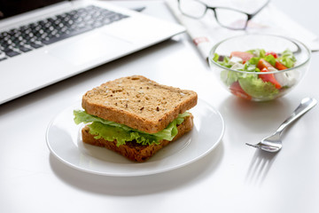 concept of lunch in office at work desktop