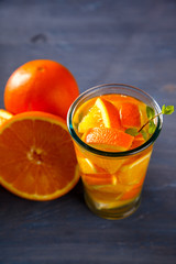 Detox Infused Water with orange.Healthy Beverage.Food  diet concept.Vegetarian.Copy space for Text. selective focus.