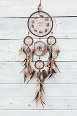
Dreamcatcher, american native amulet on wooden background. Shaman