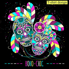 
Embroidery colorful simplified ethnic featherl and skull pattern . Vector  traditional folk bone ornament on black background for design. boho chic