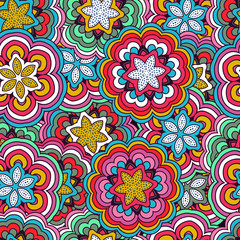 Seamless pattern. Decorated with leaves  and flowers. Doodles style.