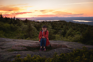 Traveler resting at mountain top
