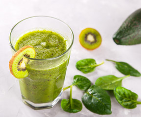 Smoothies Green. Drink Cocktail Spinach,Apple,Kiwi,Lemon,lime,avocado.Food or Healthy diet concept.Vegetarian.Copy space for Text. selective focus.