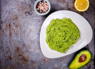 Avocado, Vegetable.Guacamole is a Traditional Mexican Sauce with Nachos.Food or Healthy diet concept.Copy space for Text. selective focus.