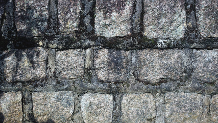 Wall of irregular stones