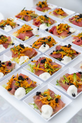 small dishes with savory appetizers