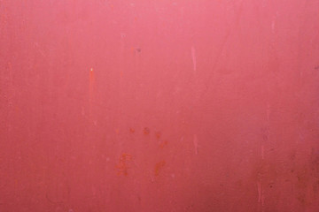 Vintage texture of old metal doors painted red