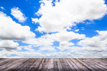 Fototapeta na wymiar wood floor with blue sky background.