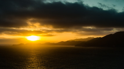 sunset over pacific ocean and west coast