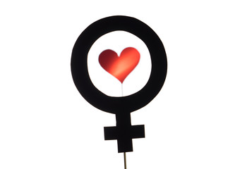 Black female and woman symbol with red heart and love icon. Feminism, homosexuality or lesbian concept. Silhouette from sign cut from cardboard paper and wooden stick isolated on white background.
