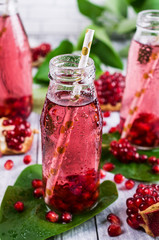 Cold transparent pomegranate drink