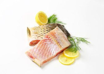 Raw carp fillets