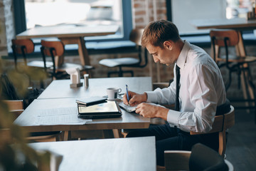 Fototapeta premium businessman in cafe