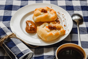 cookies and coffee on a table for breakfast