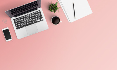 Modern workplace with notebook, coffee cup, tree, smartphone and pencil copy space on color...