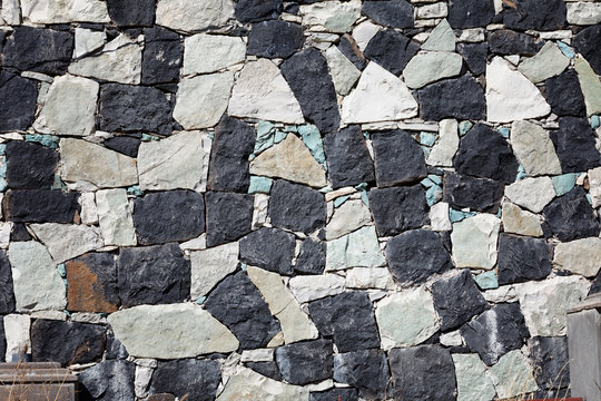 Wall stone texture of an old Sevanavank church in Sevan, Armenia