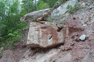Poised boulders in Bletterbach canyon, Dolomites, Italy