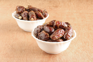 Healthy food dates in two bowls.