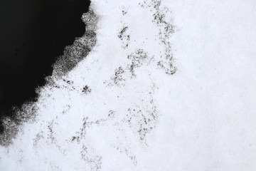 Black Ink Conveyed Over White Close-up Paper.