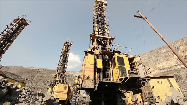 Quarry drilling machine, Quarry, The pit drill panorama, Industrial drilling rig in a quarry, large drilling machine. Quarry drilling machine