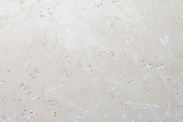 Beige stone background, natural travertine texture close up