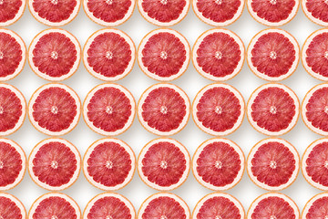 Naklejka na ściany i meble grapefruit slices pattern on white