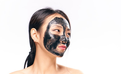 Woman in cosmetic mask on isolated background