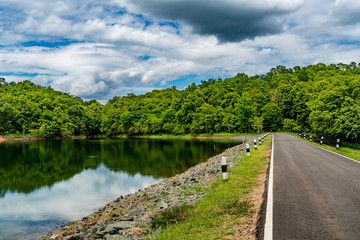 Asphalt road with yellow line
