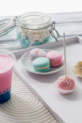 Beautiful sweets pastel shades on a beautiful wooden background. Aesthetic picture. dining, cooking, for children's parties