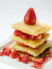 Close up of Delicious pancakes with strawberry.