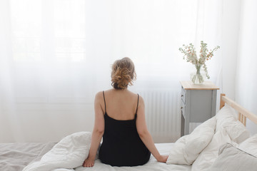 Woman sitting and stretching