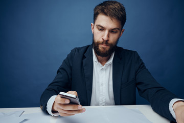 Businessman, businessman with phone, businessman on blue background