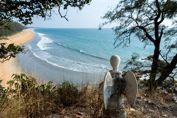 Obraz premium Guardian angel statue on the cliffs of the island, Thailand.