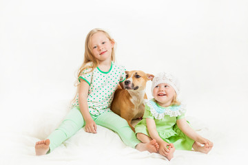 Fototapeta na wymiar two little girls and dog