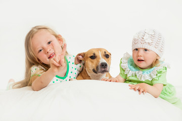 two little girls and dog