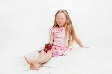 the beautiful little girl with apple