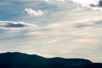 Beautiful iridescent cloud Irisation or rainbow cloud.