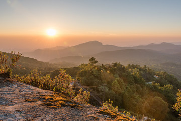 sunrise with lens flare  over moutain, view from Inthanon national park, Chiangmai, Thailand.