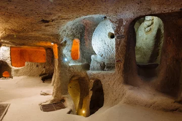 Gordijnen Interior of underground city in Cappadocia, Turkey © ninelutsk