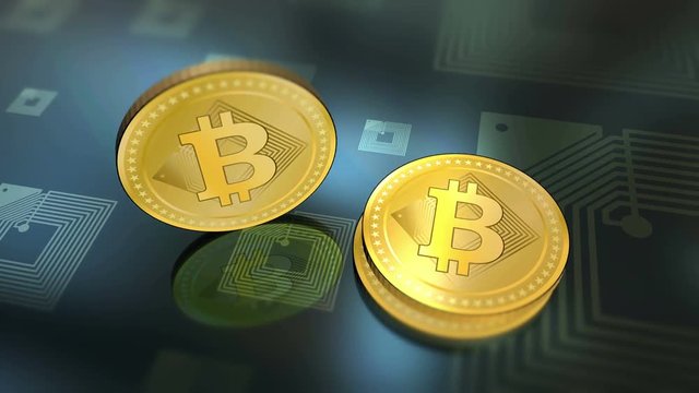 Virtual crypto-currency Bitcoins rotating coin close up on blurred background. Finance and banking concept. 4K UHD animation loop.
