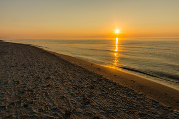 Fototapeta na wymiar Sea sunset on the beach in the summer, landscape