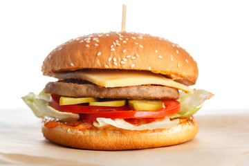 Big tasty burger with meat Patty wooden table.