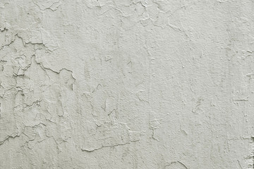 Old white cracked painted wall background texture