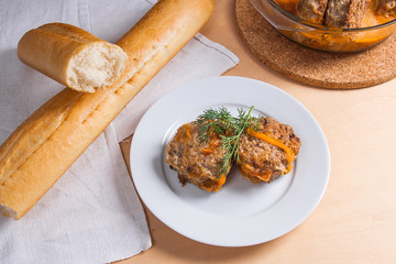 Homemade meatballs roasted with vegitables in ceramic bowl, classic recipe.