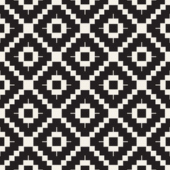 Fototapeta premium Seamless tracery pattern. Repeated lattice. Symmetric geometric abstract wallpaper. Trellis ethnic motif. Vector illustration